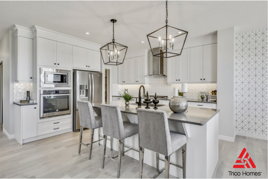 Beautiful white kitchen with island n Trico Home.