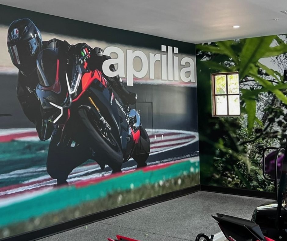 Wall wrap of motorcyclist in garage
