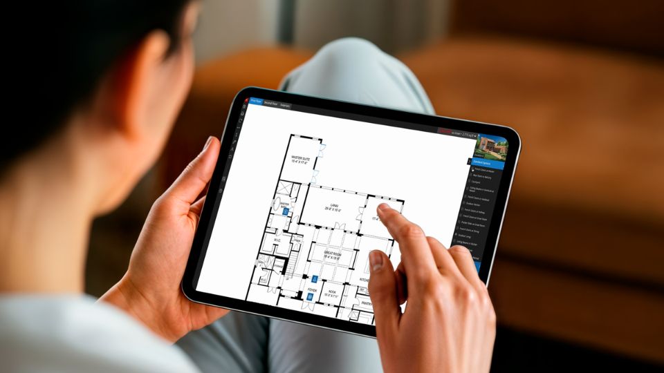 Prospective customer using portable kiosk to explore and Interactive Floor Plan (IFP)